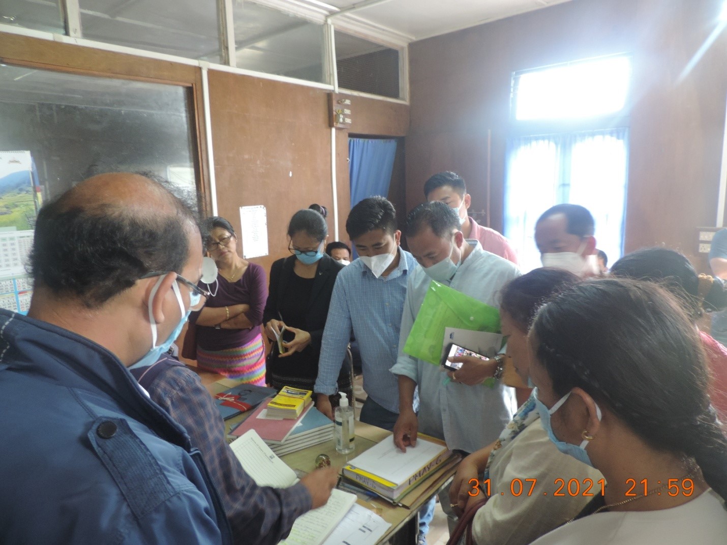 Photographs of participants verifying the documents at BDO Office at Ziro, Lower Subansiri District during Hands on training during 2 days District Level Sensitization Training on Social Audit at Siro, Lower Subansiri District.